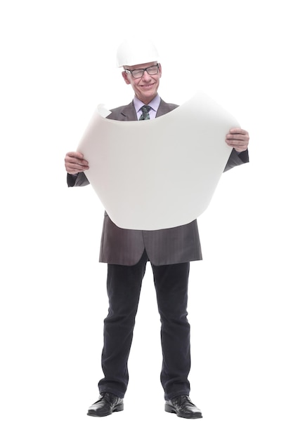 in full growth business man in a protective helmet with drawings isolated on a white background