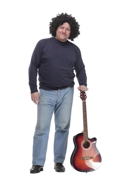 In full growth curlyhaired mature man with a guitar