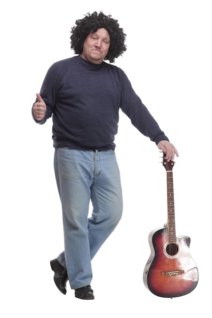 In full growth curlyhaired mature man with a guitar