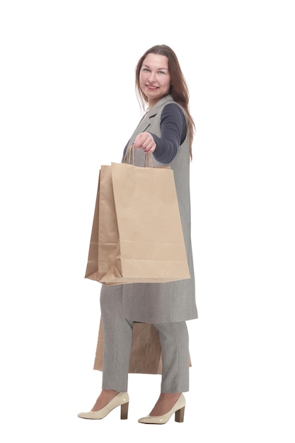 In full growth elegant woman with shopping bags