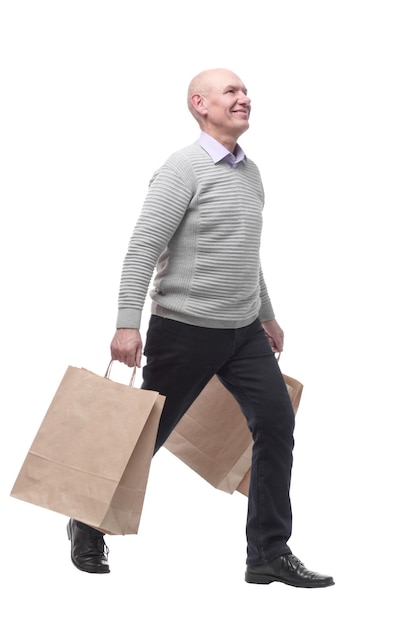 In full growth happy man with shopping bags