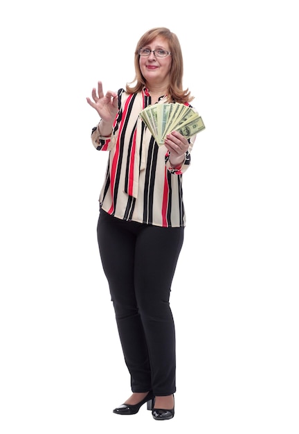 In full growth happy woman with money bills showing keys