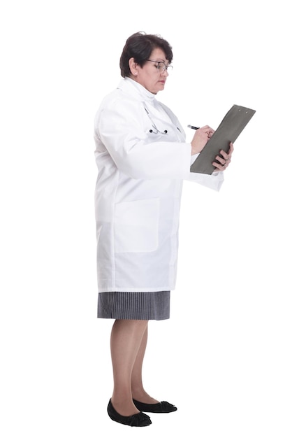 In full growth senior female doctor with a clipboard