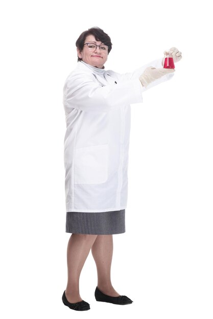 In full growth senior female medic with a laboratory flask