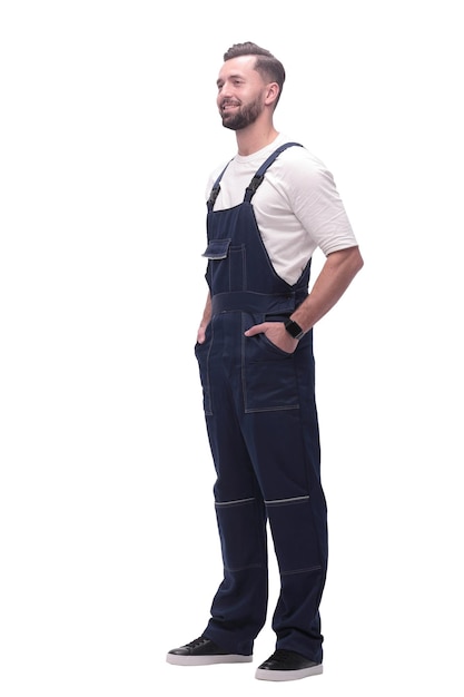 In full growth smiling man in overalls