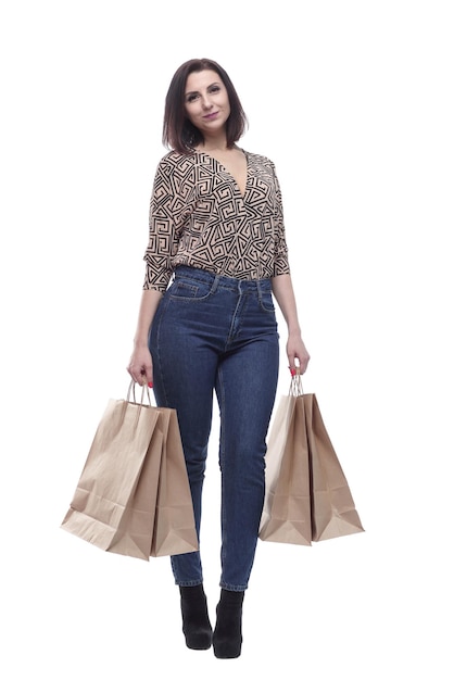 In full growthattractive young woman with shopping bags