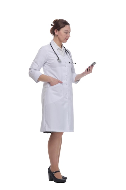 In full growthfemale doctor with a smartphone