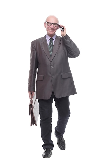 In full growthsmiling business man with a smartphone