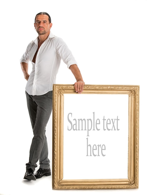 Full length of man holding a blank banner in old frame