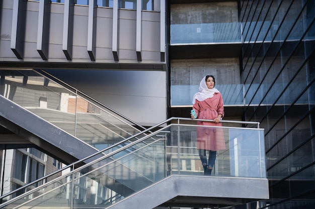 Photo full length of man standing on staircase