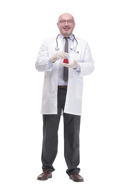 Full-length. mature doctor with a laboratory flask. isolated on a white background.