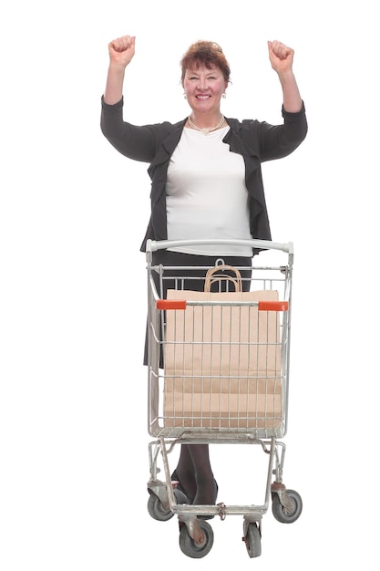 Full length portrait of a woman pushing a shopping trolley