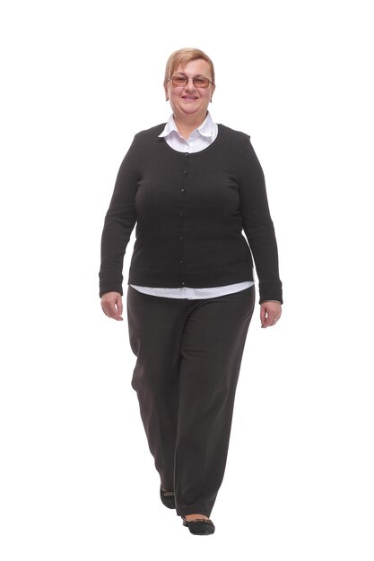 Full length profile shot of an elderly woman walking