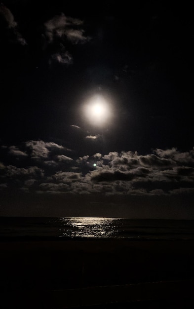 Full moon over the calm sea