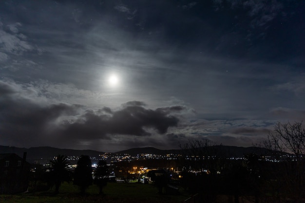 Full moon through the clouds on a cold winter morning!