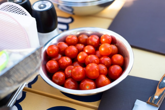 full plate of ripe red cherry tomatoes