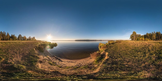 Full seamless spherical cube panorama 360 degrees angle view on the shore of width river neman in sunny summer evening sunset in equirectangular projection ready for AR VR virtual reality content