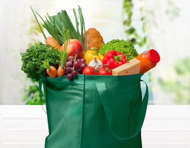 Full shopping  bag, isolated over  background