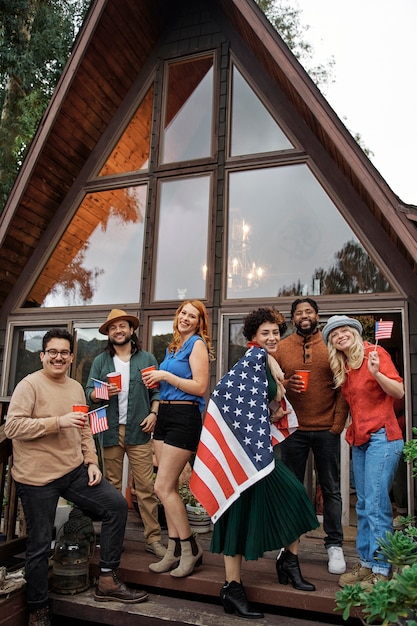 Full shot americans celebrating 4th of july outside