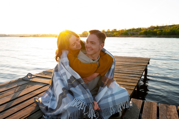 Full shot couple in affectionate attitude