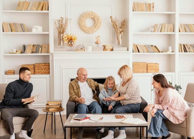 Full shot happy family indoors