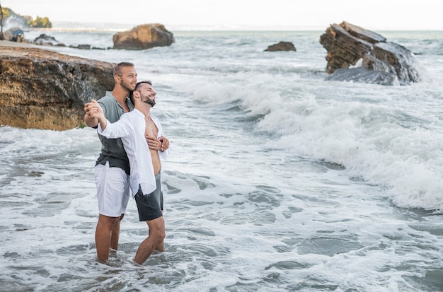 Full shot happy men being romantic