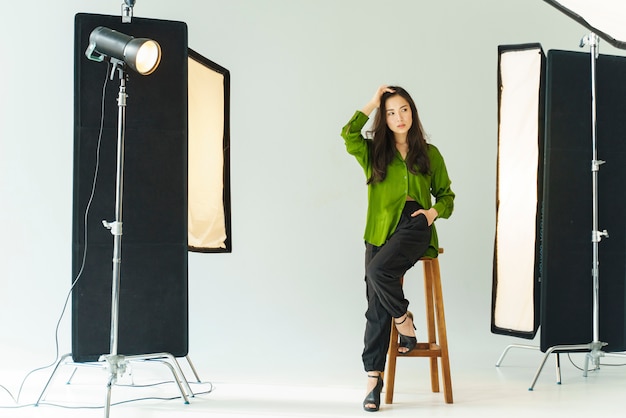 Full shot model posing in studio