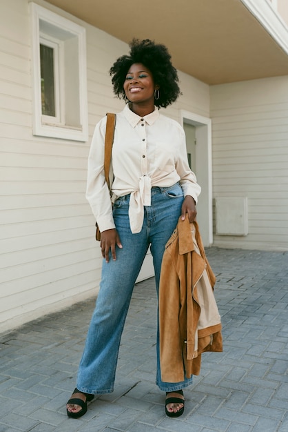 Full shot smiley beautiful black woman