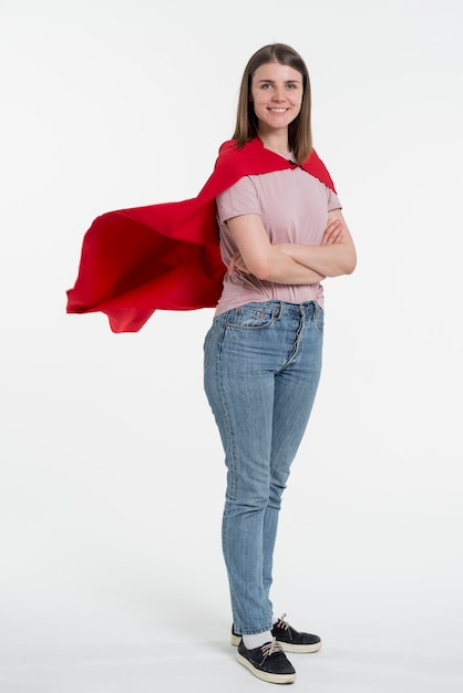 Full shot woman wearing red cape