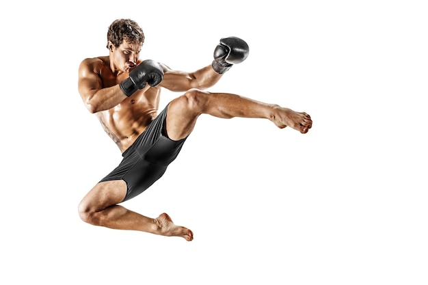 Full size of athlete kickboxer who perform muay thai martial arts on white background sport concept