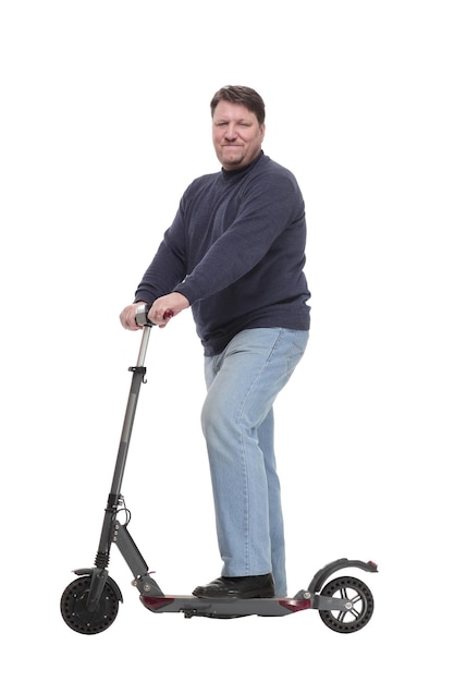 Fulllength mature man with an electric scooter