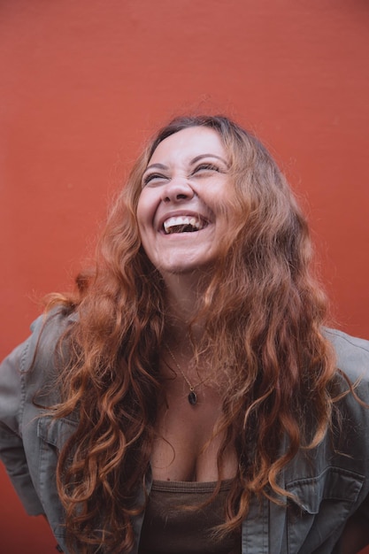 Fun joy happiness and positive emotions Portrait of happy emotional young red haired female with chubby cheeks and curvy body being in good mood