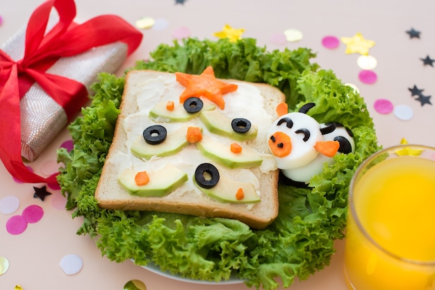 Funny breakfast, sandwich. Christmas trees, an egg bull.