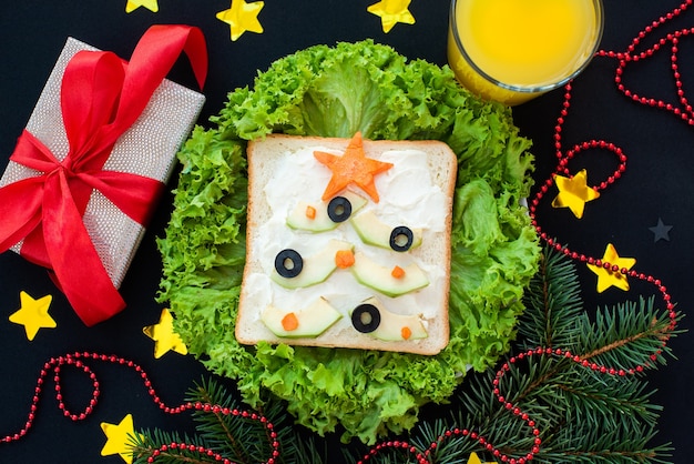 Funny breakfast, sandwiches in the form of Christmas trees.