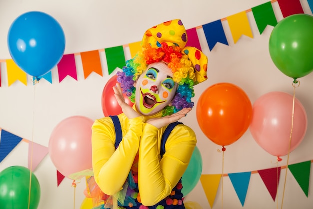 Funny clown at a colorful party