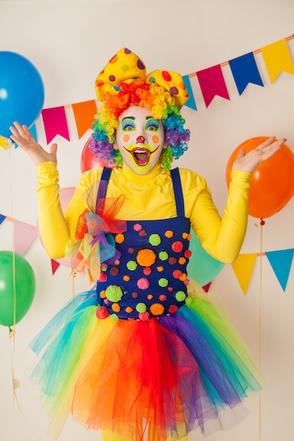 Funny clown at a colorful party