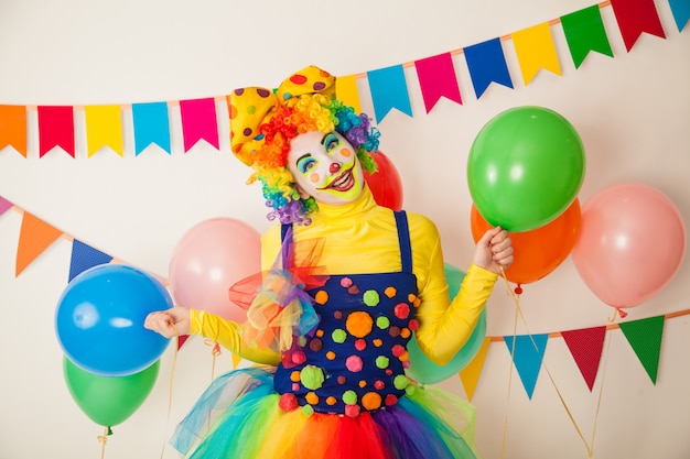 Funny clown at a colorful party