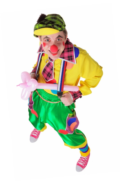 Funny clown with a pink flower from a  balloon isolated on the white background