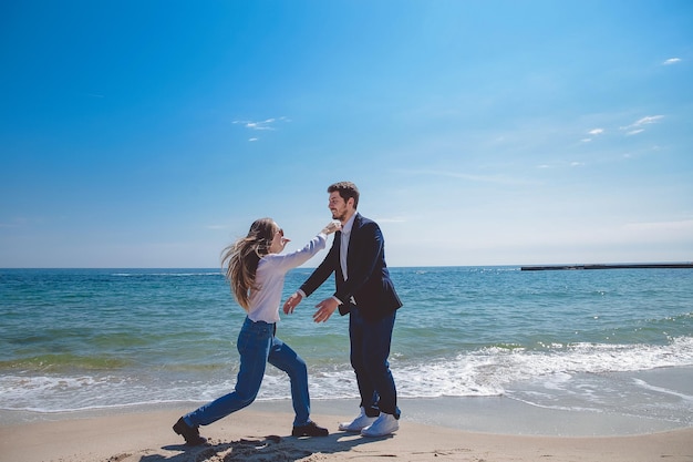 Funny couple near sea