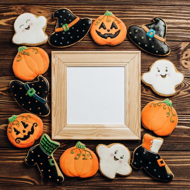 Funny delicious ginger biscuits for Halloween on the table. horizontal view from above