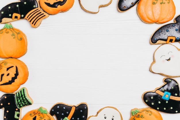 Funny delicious ginger biscuits for Halloween on the table. horizontal view from above