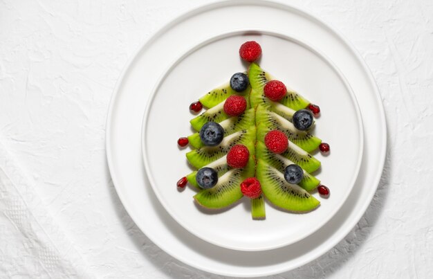 Funny edible Christmas tree Christmas breakfast idea for kids Copy space for text