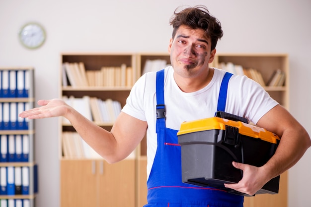 Funny Man doing electrical repairs at home