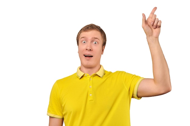 Funny young guy in yellow Tshirt with eureka gesture man got idea isolated white background