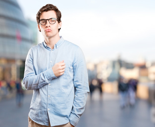 Funny young man doing a seductive gesture