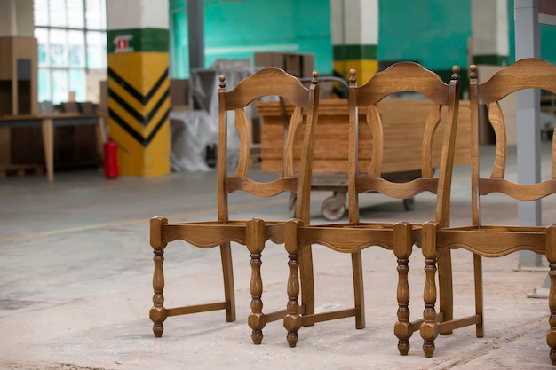 Furniture production from a natural tree Production of chairs at the factory