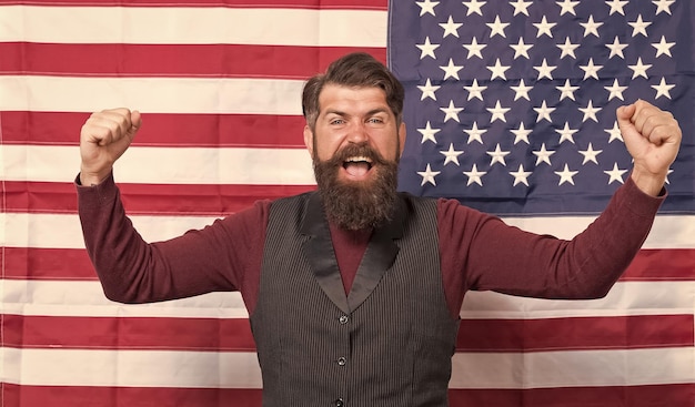 Photo for the future happy celebration of victory bearded hipster man being patriotic for usa american education reform in july 4 american citizen at usa flag american citizen in the election