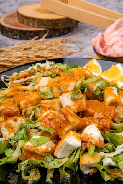 gado gado is an indonesian salad of slightly boiled blanched or steamed vegetables