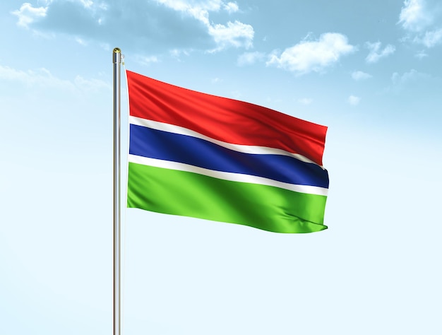 Gambia national flag waving in blue sky with clouds Gambia flag 3D illustration