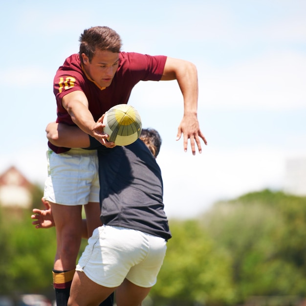 Game rugby and men with fitness teamwork and energy with wellness training and action Professional players athlete or team with fun match or sports with ball skills and competition with health